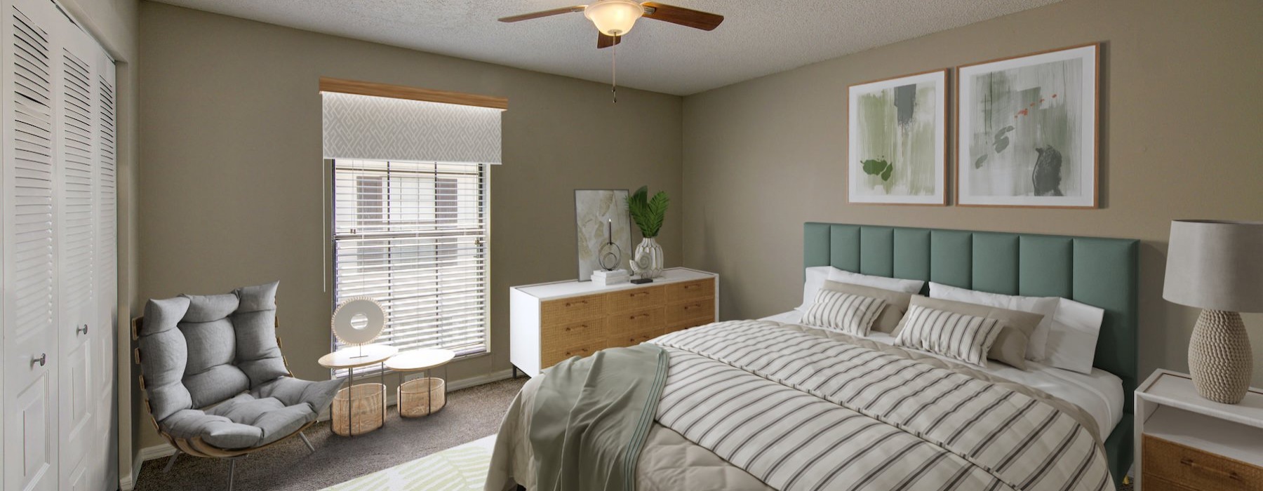 a bedroom with a bed and a fan