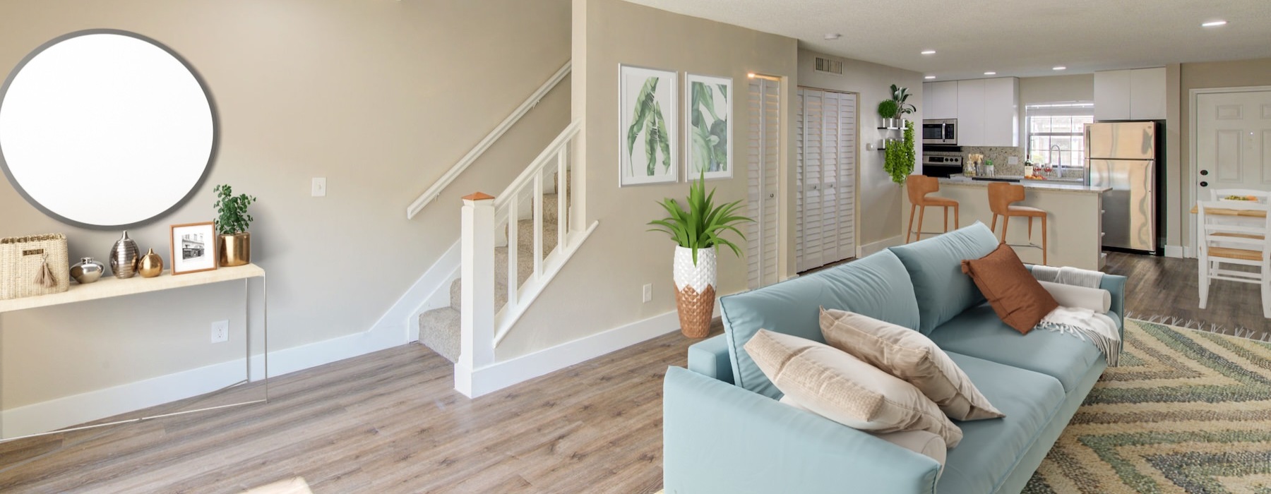 a living room with a large mirror