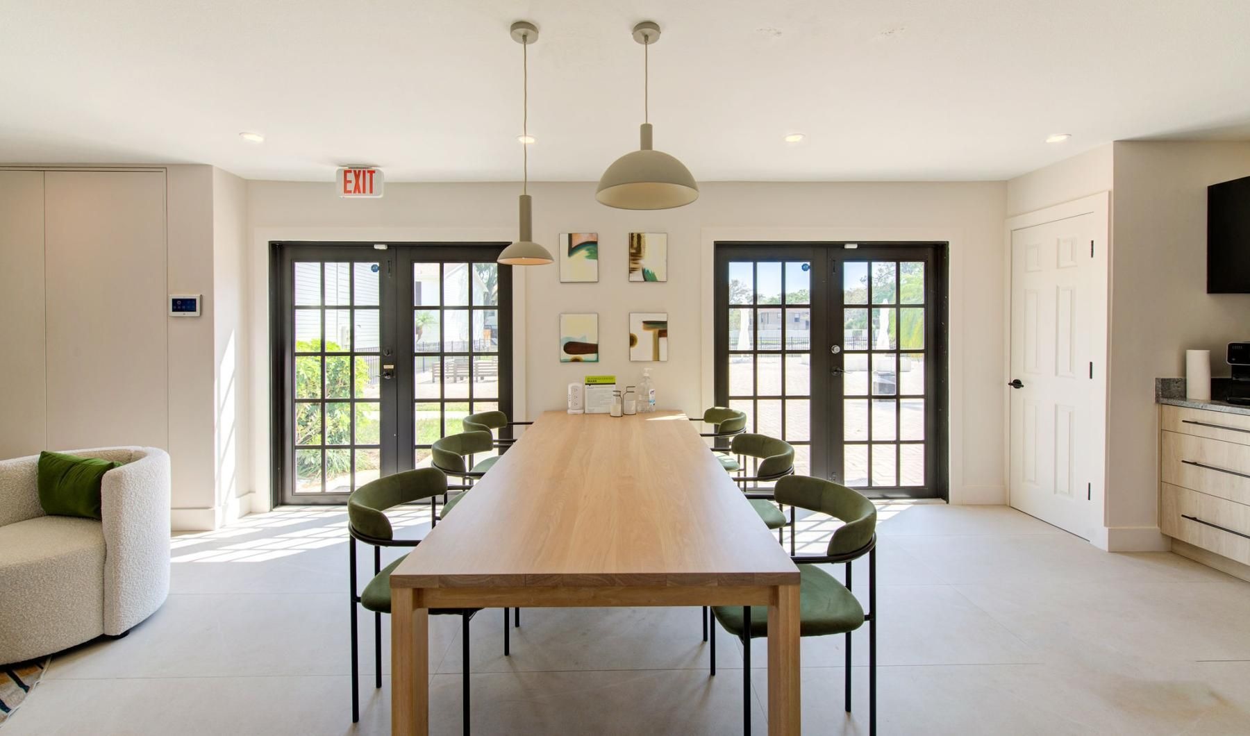 a dining room with a table and chairs