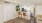 a kitchen with white cabinets
