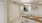 a kitchen with a dining table